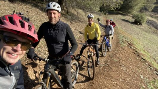Guys biking on a trail at Six Sigma Ranch and Winery